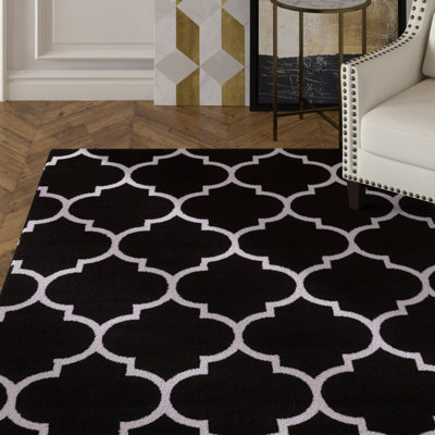 Tapis noir / blanc à motif abstrait Newlon