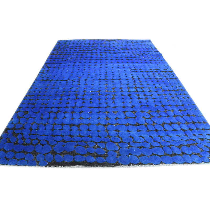 Tapis bleu Iniguez