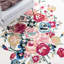Tapis floral rose / rouge / ivoire en laine / coton touffeté à la main Delmarie-555594221