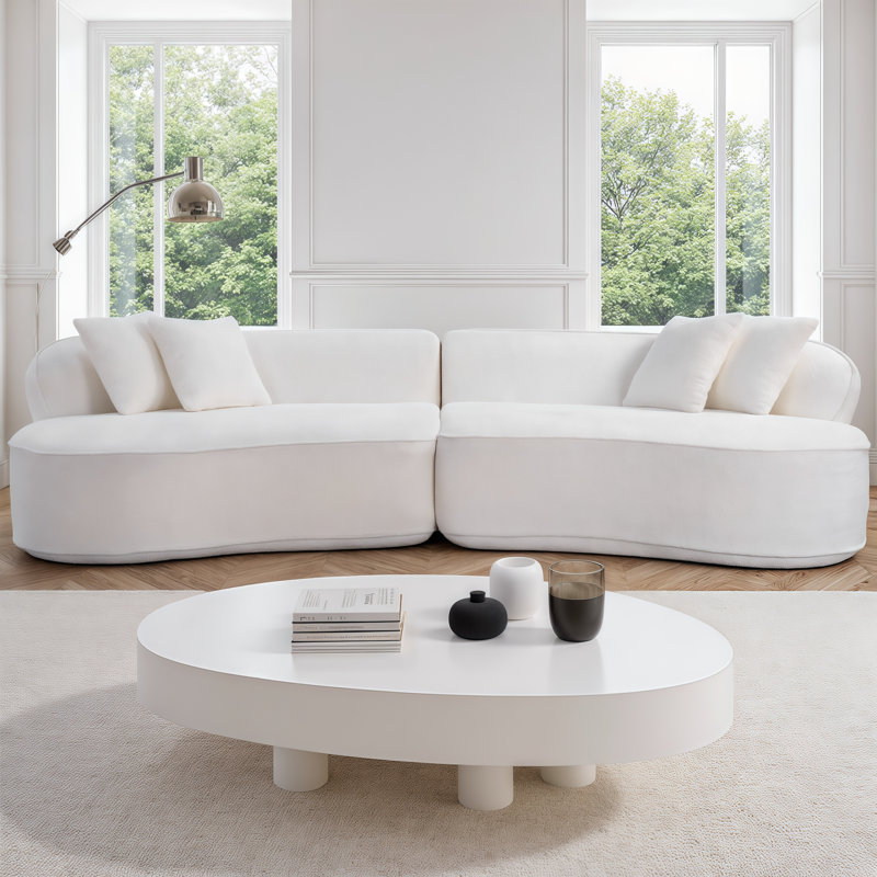 Canapé-lit modulaire incurvé en forme de L avec support à ressorts ensachés, canapé de luxe sans assemblage pour les salons et les petits espaces Syrova