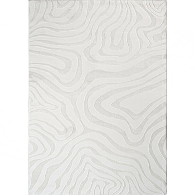 Tapis luxueux au design abstrait crème