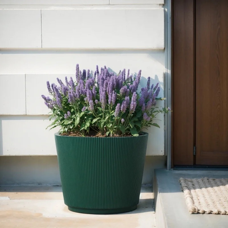 Pot à fleurs vert en résine recyclée