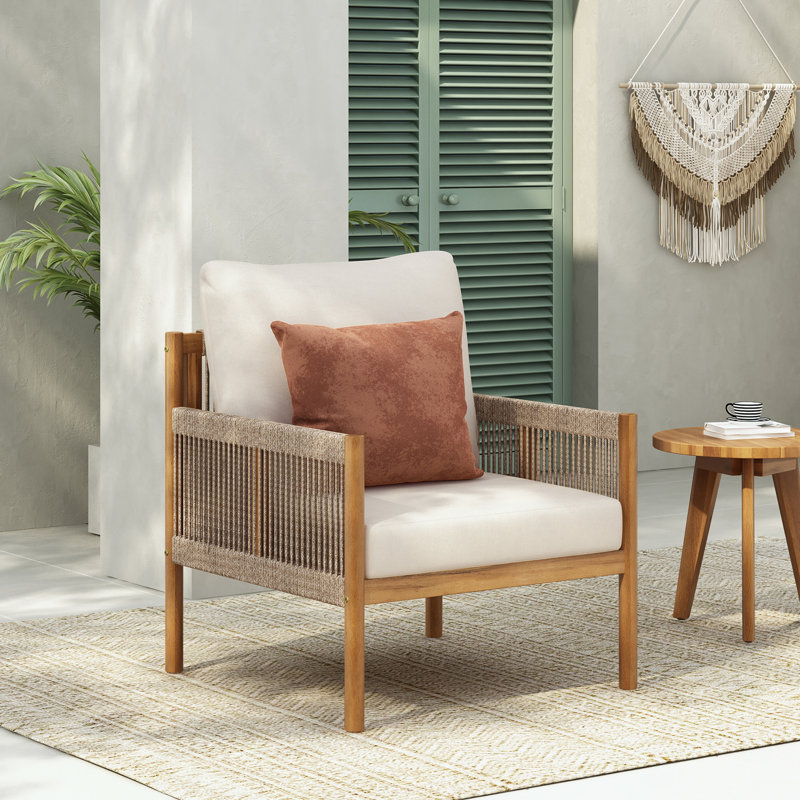 Fauteuil avec cadre en bois et coussin moelleux