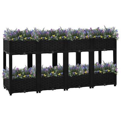 Boîte à fleurs surélevée avec rotin Tathan