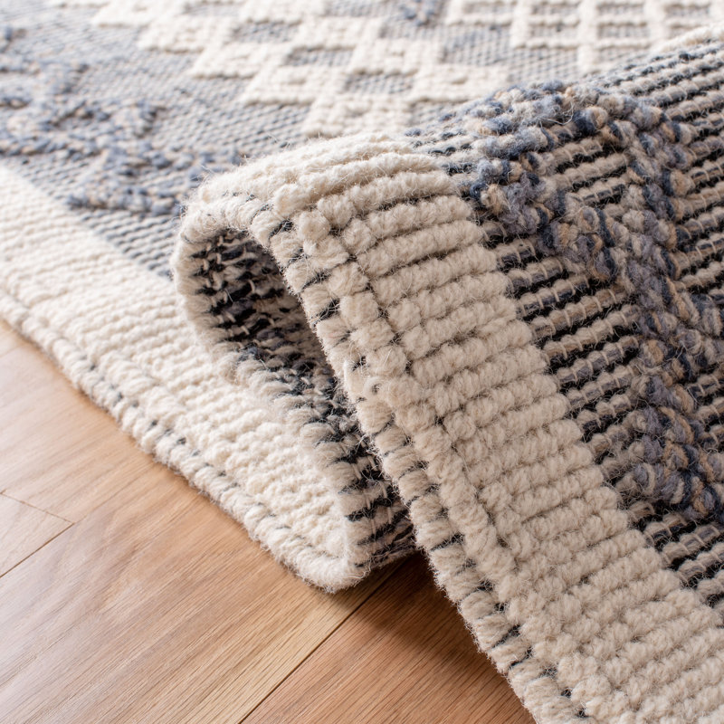 Natura 9' x 12' Blue and Cream Wool Handwoven Area Rug