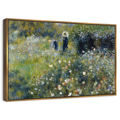 Femme avec un parasol dans un jardin