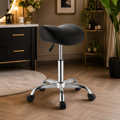 Le tabouret à roulettes de selle, pouvant supporter jusqu'à 500 livres, est réglable en hauteur, le coussin de siège ergonomique en cuir de polyuréthane, supporte une rotation à 360 °, convient aux salons de beauté, aux spas, aux bars, aux maisons, aux centres médicaux et aux massages. Noir