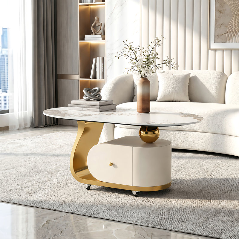 Table basse ovale moderne de 39,4 po avec rangement, plateau en pierre frittée et roulettes verrouillables, White / Gold
