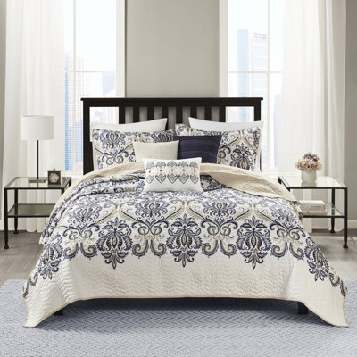 Courtepointe réversible, bleu marine / brun clair, double / grand. Mise à jour du motif cachemire, surpiqué. 100% microfibre avec revers beige. Comprend 1 courtepointe, 2 taies décoratives et 3 coussins. Lavable à la machine 6 microfibres modernes.