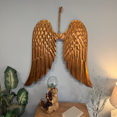 Bohemian copper-bronze metal angel wings wall sculpture, jute rope hanger, 34 inches wide