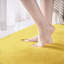 Tapis jaune en similifourrure tissé à la machine Novelty Haevyn-831657425