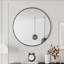 Miroir mural de forme ronde avec cadre en métal