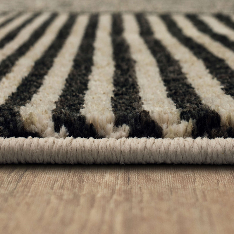 Linea Black Geometric Polyester 28''x94'' Area Rug