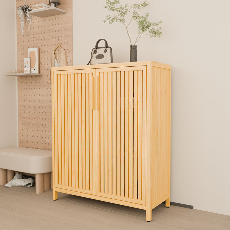 Armoire multi-scène de 42 pouces avec tablettes ouvertes pour la cuisine et la salle de bain. Rangement caché dans les portes.