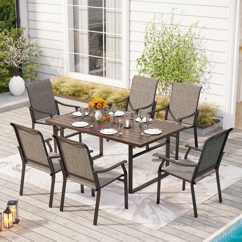 Basima 6 - Person Patio Dining Set with Rectangular Table