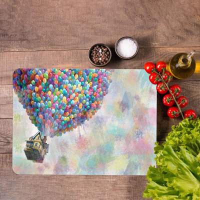 Planche à découper contemporaine avec un ballon à air coloré en verre durable, idéal pour ajouter une touche de couleur à votre décor de cuisine