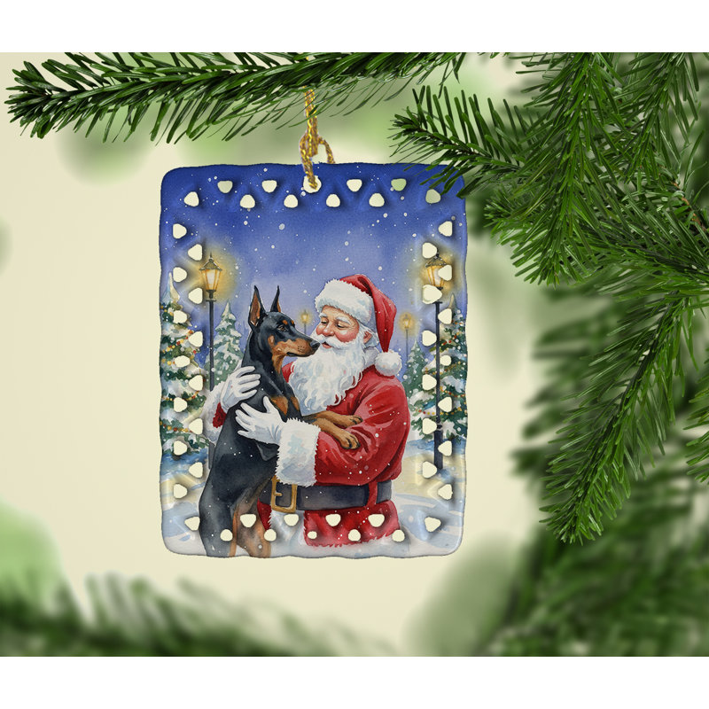 Ornement en porcelaine Doberman Pinscher avec le Père Noël, Doberman pinscher
