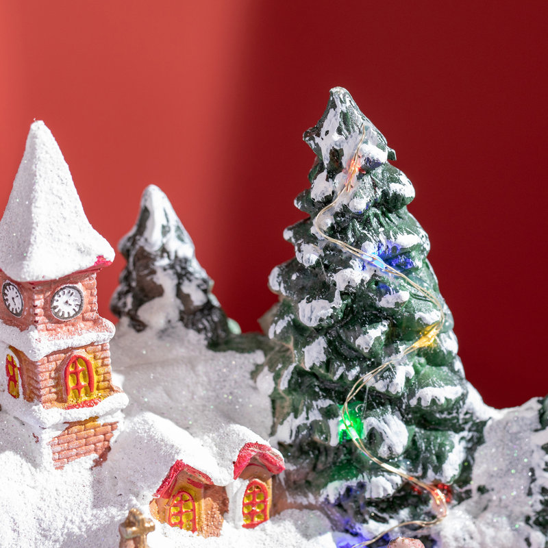 Scène animée de village de Noël