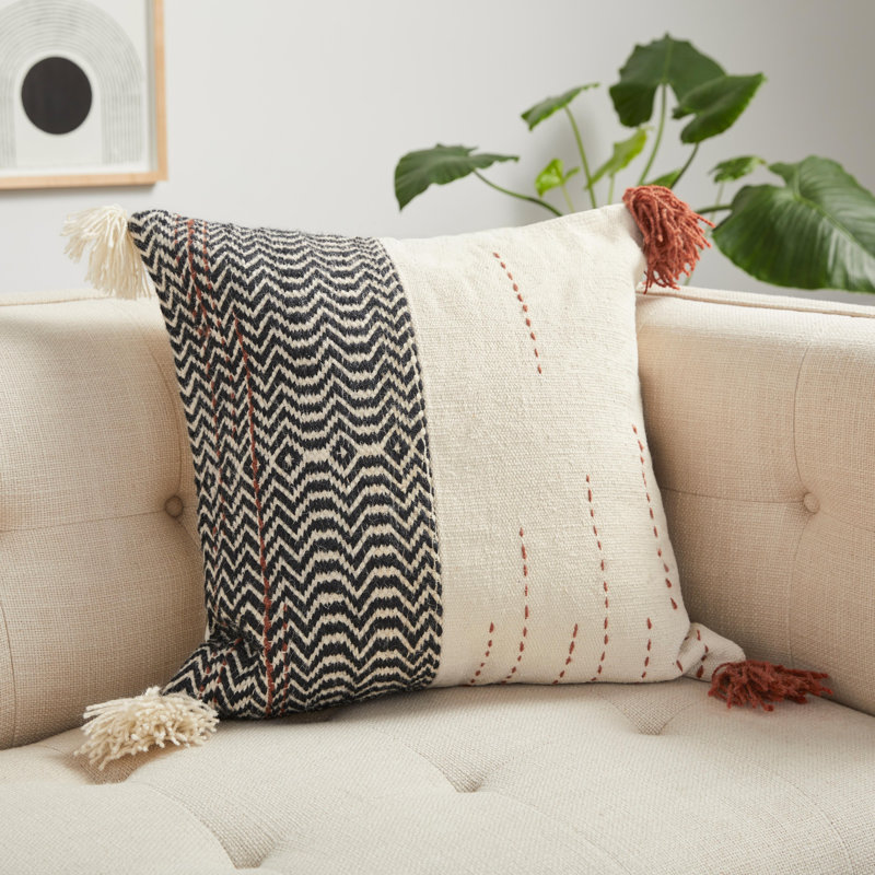22" Black and Ivory Cotton Blend Square Pillow with Tassels