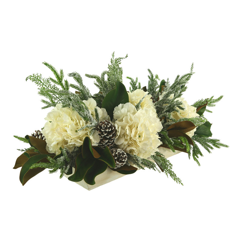 Snowy Holiday Arrangement with Hydrangeas, Magnolia Leaves and Pinecones