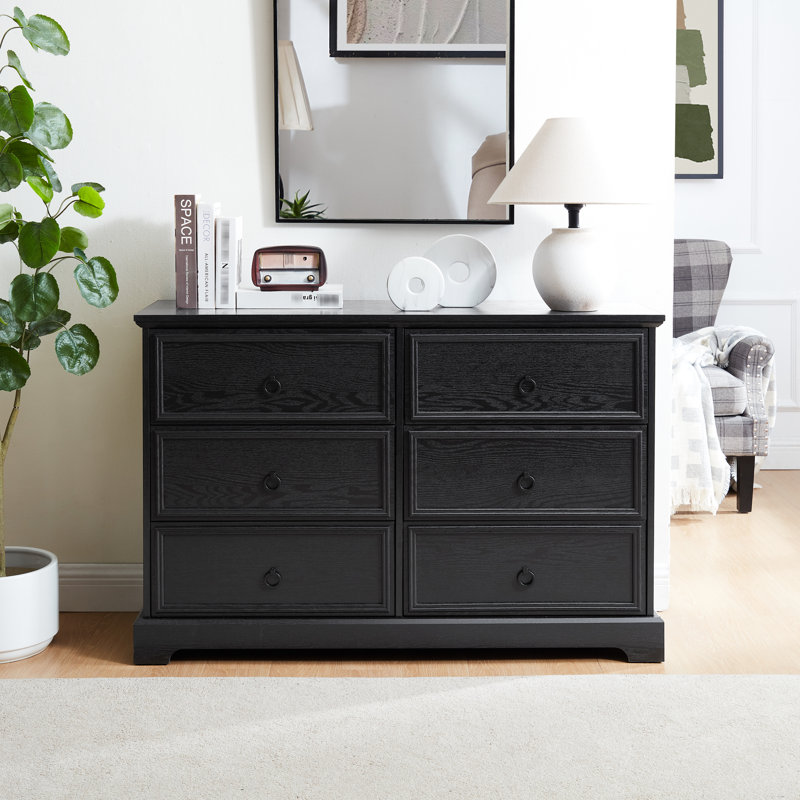 Commode noire pour chambre à coucher avec rangement élégant et poignées élégantes