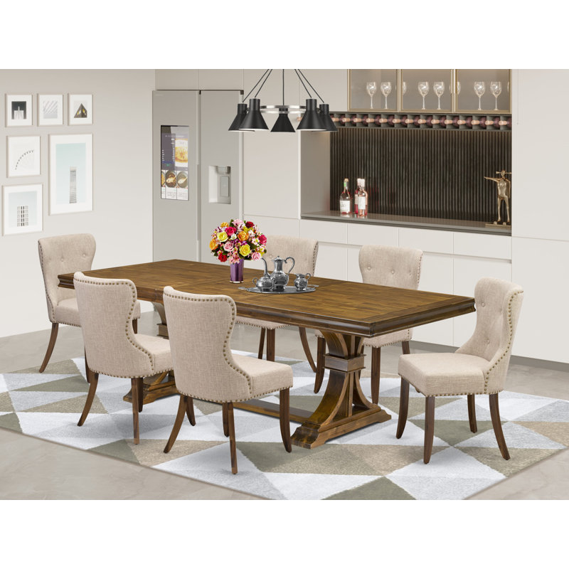 L'ensemble de table de salle à manger 7 pièces se compose d'une table de salle à manger moderne et de 6 chaises rembourrées en tissu de lin brun clair avec dossier capitonné - Finition noyer antique