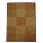 Wasif Area Rug in Brown