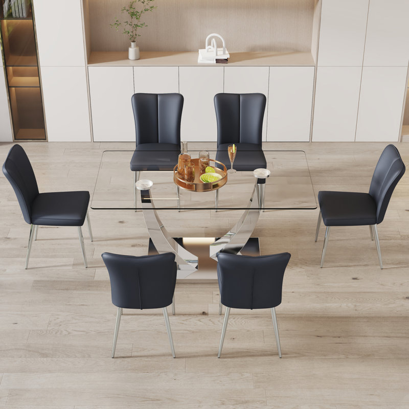 Ensemble de table et de chaises, ensemble de salle à manger en verre trempé de luxe subtil - 63 po x 35,4 po avec 6 chaises en polyuréthane avec un motif à rayures verticales sur le dossier. Pieds en métal argenté.