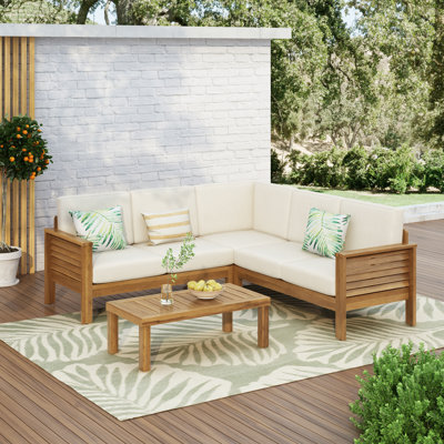 Ensemble de conversation d'extérieur en bois d'acacia avec coussins 4 pièces Kyree