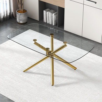 Grande table de salle à manger rectangulaire moderne en verre minimaliste avec plateau en verre trempé de 0,39 po et pieds en métal doré pour la cuisine, la salle à manger, le salon, la salle de réunion et la salle de bal 71 po x 35,4 po x 30 po.