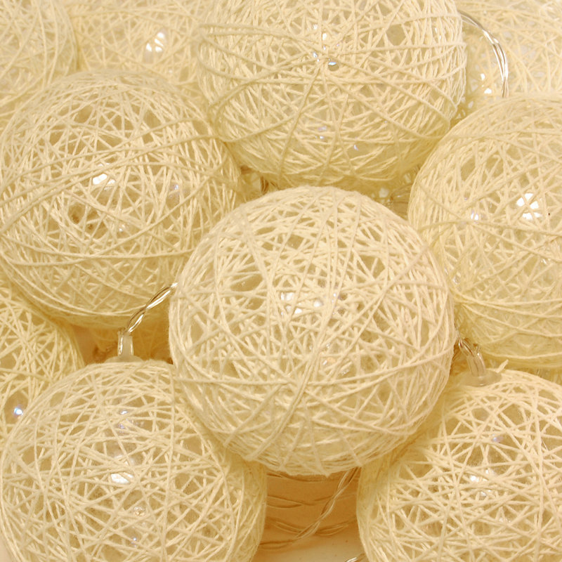Guirlande solaire avec 20 globes en coton blanc doux