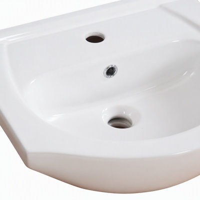 Meuble-lavabo autoportant de 20 po avec lavabo en céramique et porte à fermeture en douceur