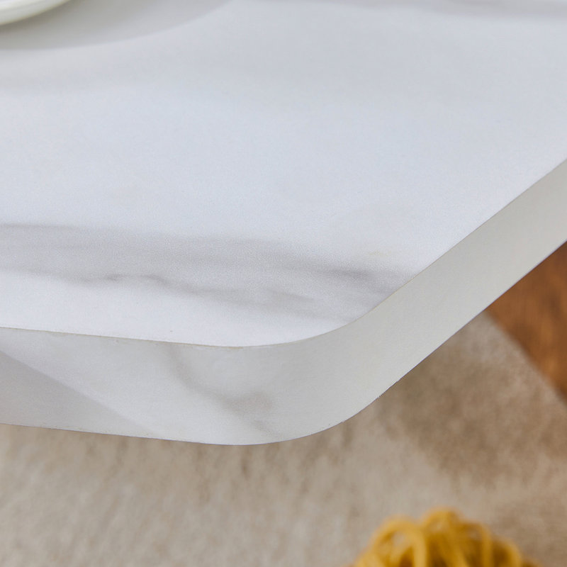 Table basse hexagonale de 31 pouces de style moderne avec surface en marbre blanc.