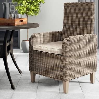 Beachcrest Home Danny Wicker Outdoor Dining Armchair with Cushion & Reviews  | Wayfair