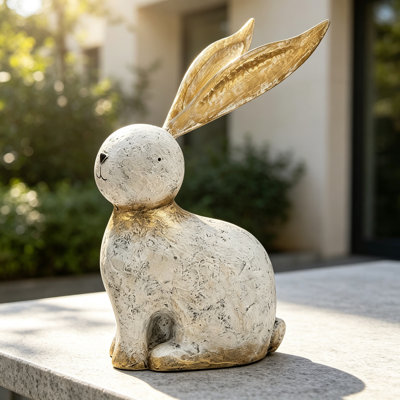 Charmante figurine de lapin en magnésium blanc avec oreilles en fer doré, parfaite pour un décor moderne et rustique