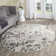 Makeba Floral Ivory/Gray/Purple Area Rug