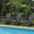 Ergonomically designed resin folding Adirondack chair-328065403