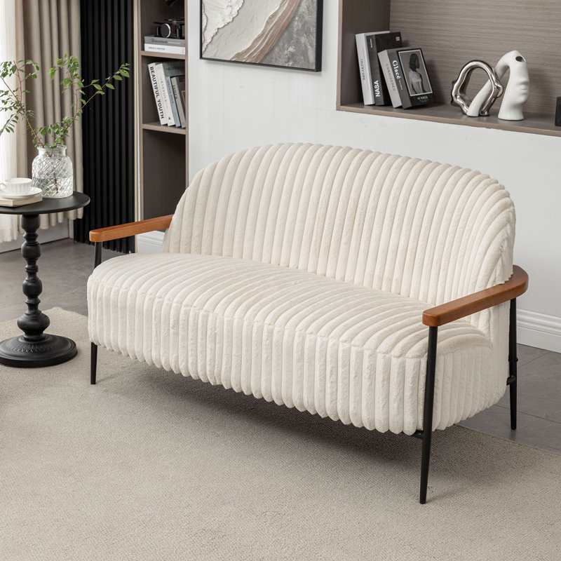 Canapé capitonné Megham avec pieds en fer, Beige