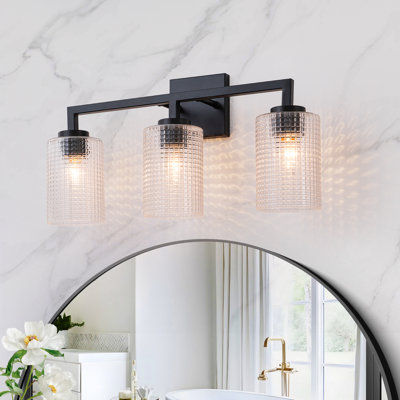 Applique murale linéaire pour salle de bain avec abat-jour cylindrique en verre à grille