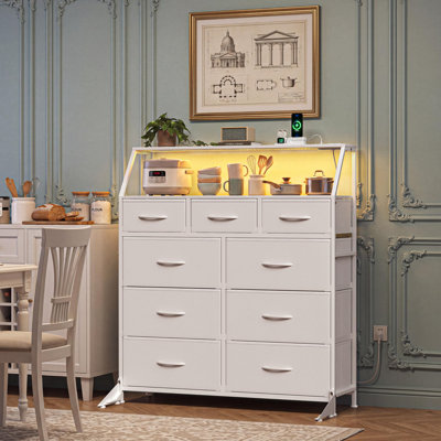 Commode blanche à 9 tiroirs avec lumières DEL et station de charge, coffre en tissu avec cadre en acier, rangement pour grande chambre, blanc