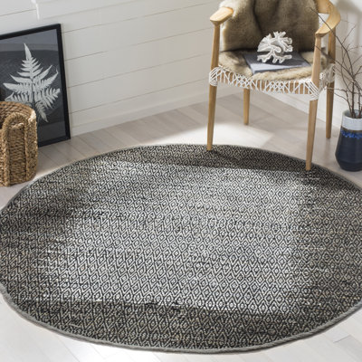 Tapis géométrique en cuir tissé à la main Phillis