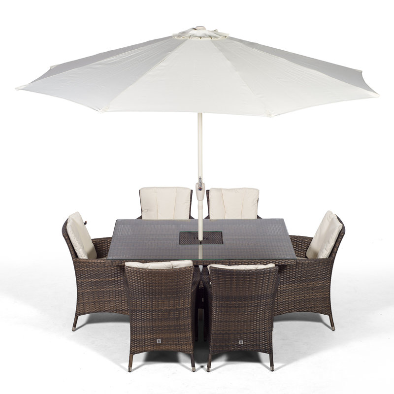 Karcher 6 - Person Patio Dining Set Umbrella Hole Included Rectangular Table with Cushions Included, Brown