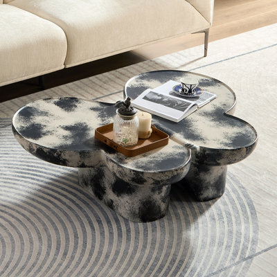 Style papillon, table basse, imitation de calcaire naturel, convient pour le salon / bureau, combinaison de fibre de verre, noir et beige.