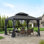 Pavillon de jardin à toit rigide à énergie solaire 10 pi x 12 pi Sunjoy Merston