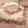Burnie Oriental Cream/Red Area Rug
