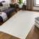 Lowe Hand Woven Wool Cream Area Rug