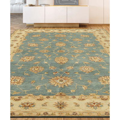 Tapis bleu et ivoire de haute qualité noué à la main