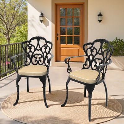 Cast Aluminum Patio Armchair With Black Frame And Cushions In Beige Colors