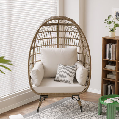 Fauteuil à œufs surdimensionné pour terrasse - osier en rotin avec coussin beige épais et support en métal robuste, parfait pour le porche, la cour arrière et le salon (coussin beige)