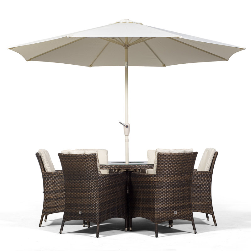 Karcher 6 - Person Wicker Patio Dining Set with Round Table , Cushions Included, Brown
